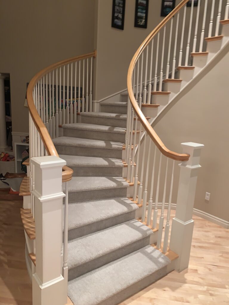 Light gray carpet on stairs. 