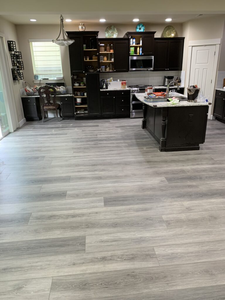 Gray wood flooring in kitchen