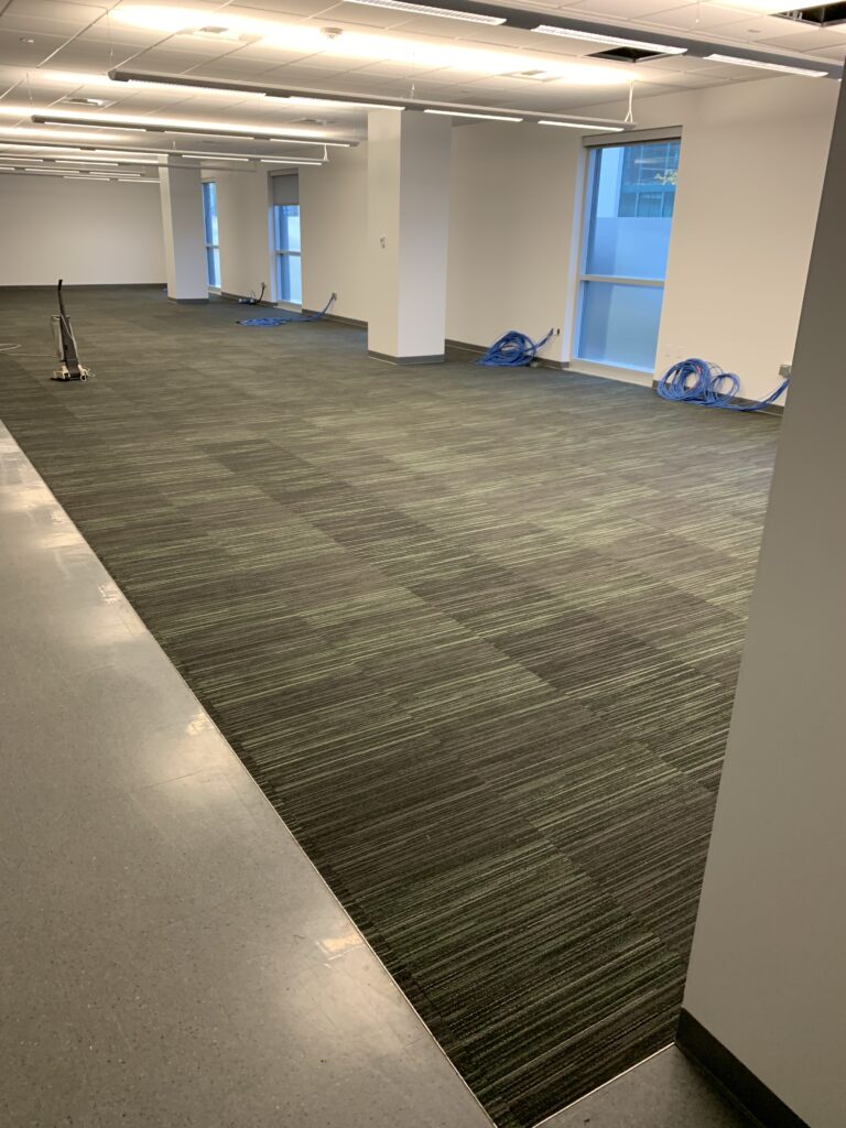 A large carpet installed in a large office. Flooring services near me. Flooring Pacific Northwest